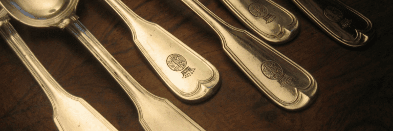 Silver spoons engraved with von Maltzahn family coat of arms on fiddle pattern handles