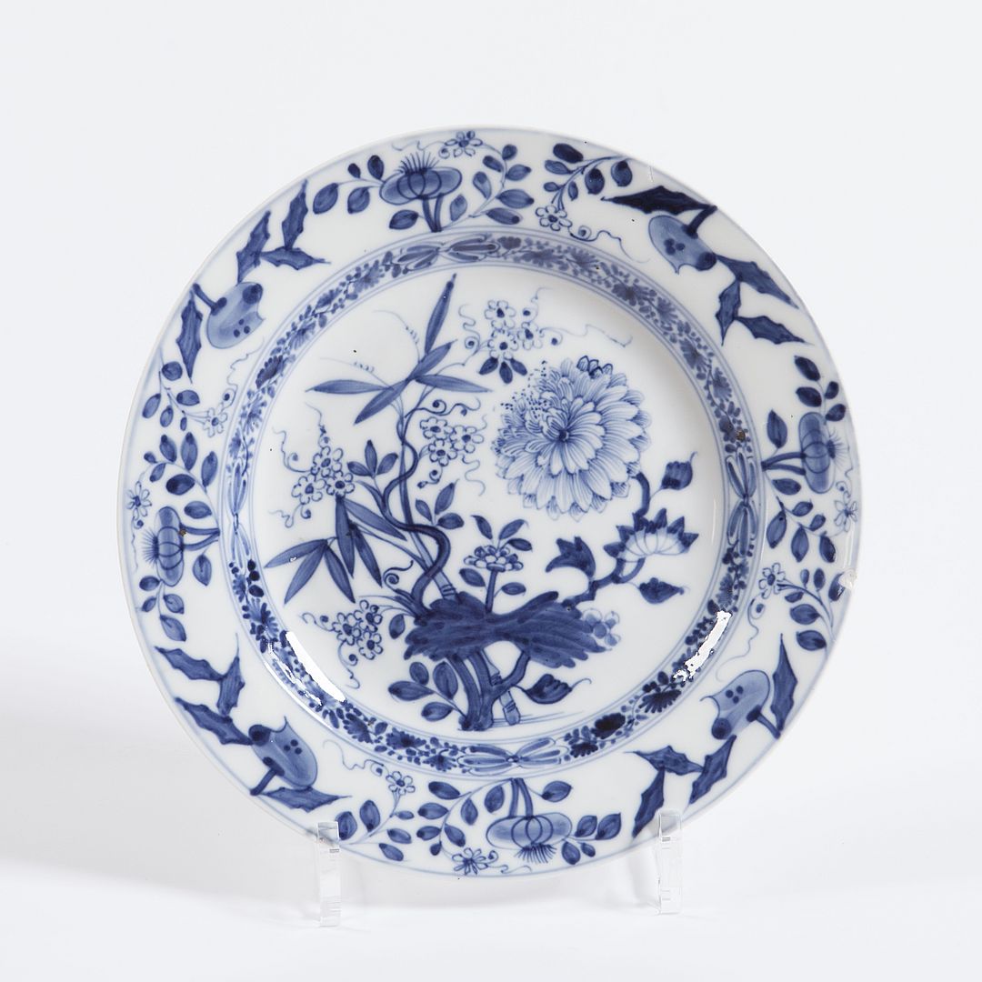 Cobalt blue porcelain in Zwiebelmuster blue onion style with central chrysanthemum and foliage