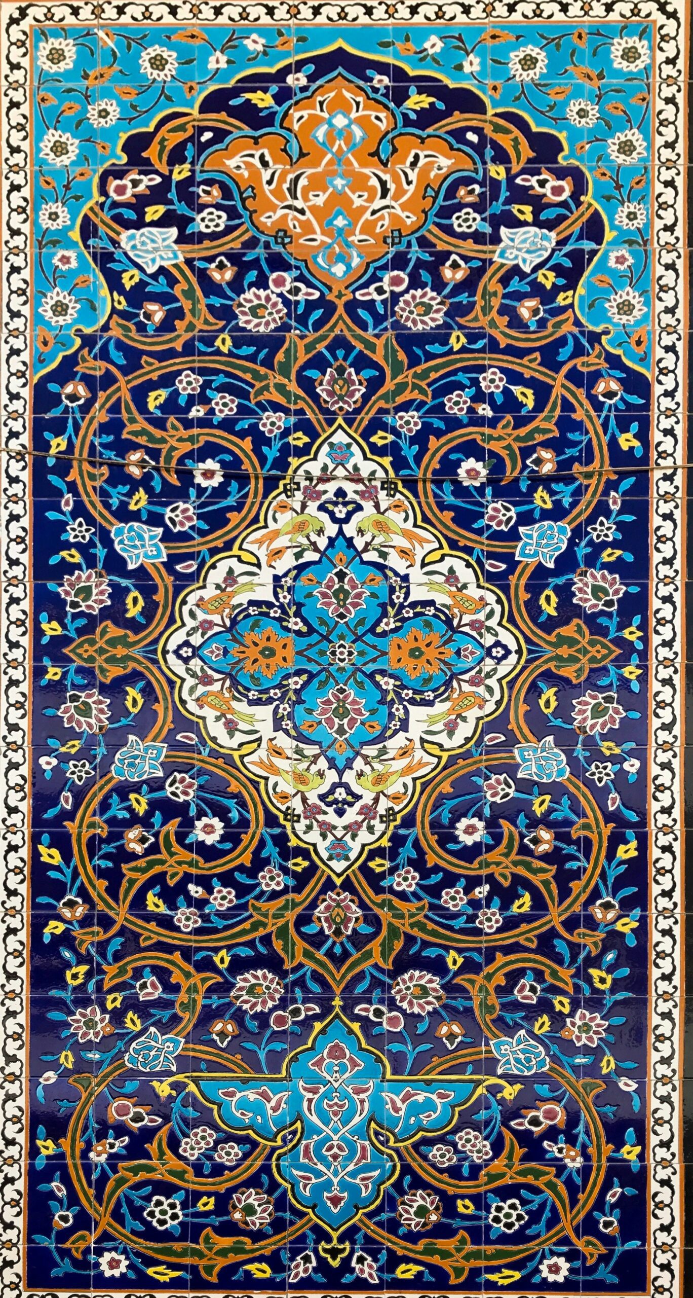 Shah Mosque tile panel from Isfahan with turquoise arabesques, floral motifs and intricate geometric patterns