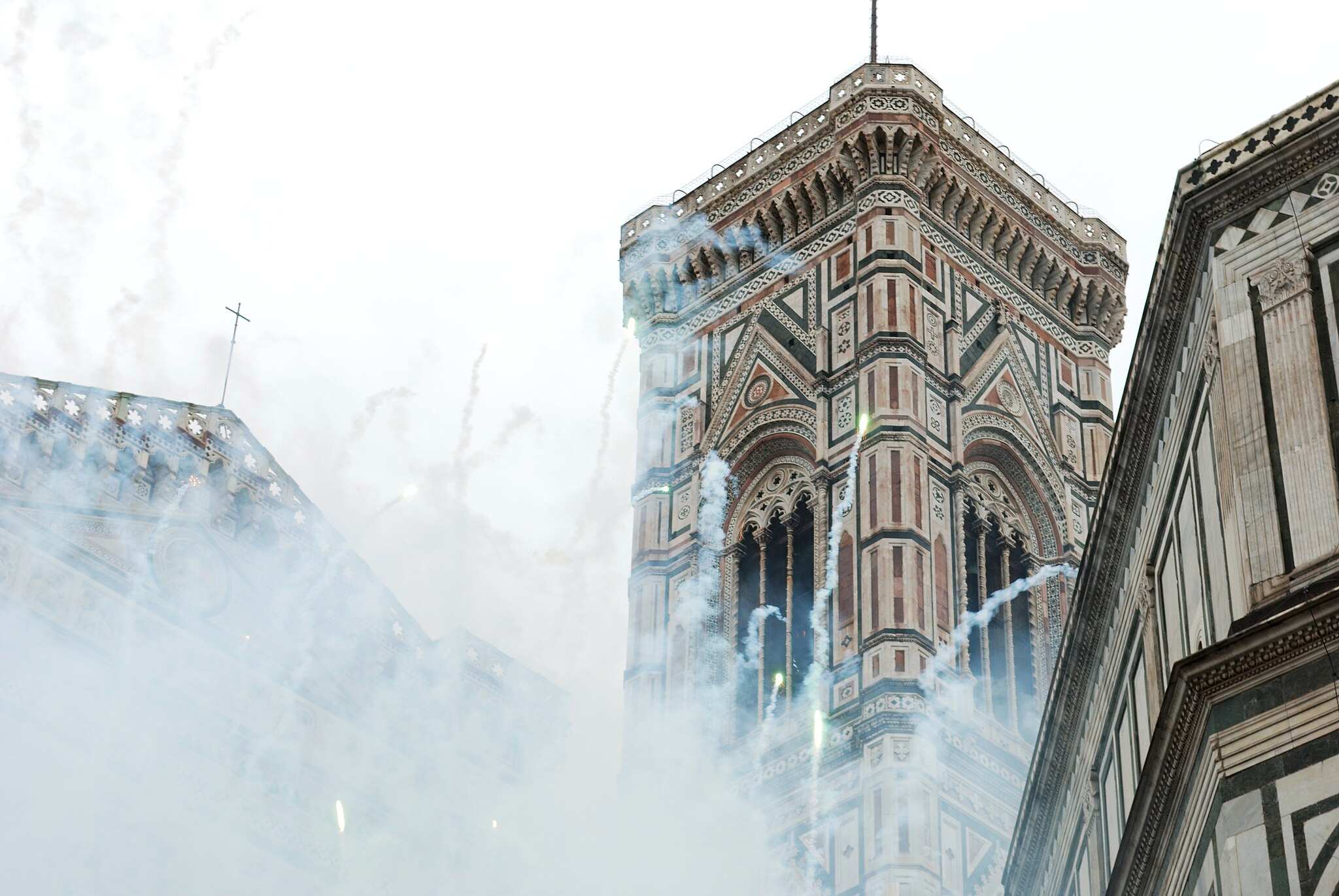 Fireworks and smoke billowing before Florence Cathedral during the Scoppio del Carro Easter tradition